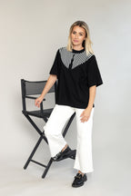 "BALTI BRŪKŠNELIAI", JUODI MARŠKINĖLIAI