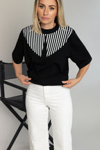 "BALTI BRŪKŠNELIAI", JUODI MARŠKINĖLIAI